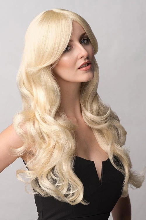 Blonde wig with big loose curls and sweeping fringe, extra long: Carly