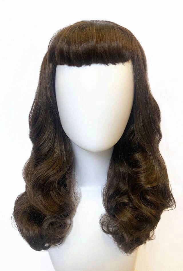 Brown 1950s pinup style wig, with long waves and a short fringe: Rosie