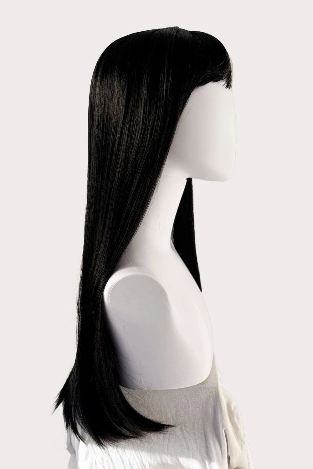 Long, black, straight wig with platinum fringe streak and retro, straight fringe: Imogen