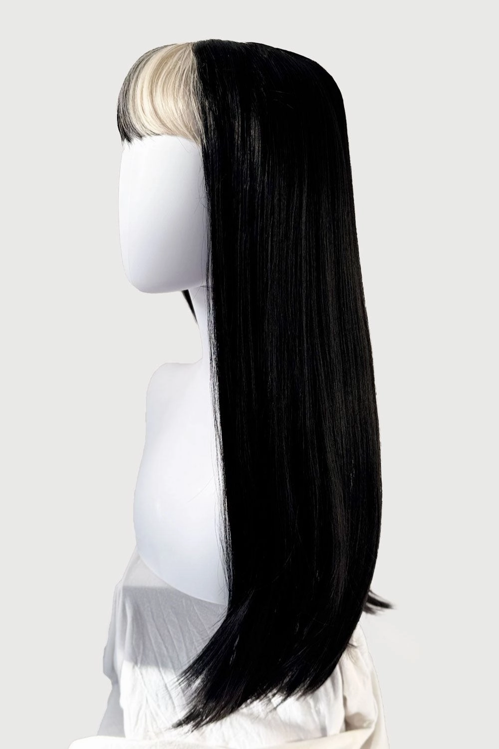 Long, black, straight wig with platinum fringe streak and retro, straight fringe: Imogen