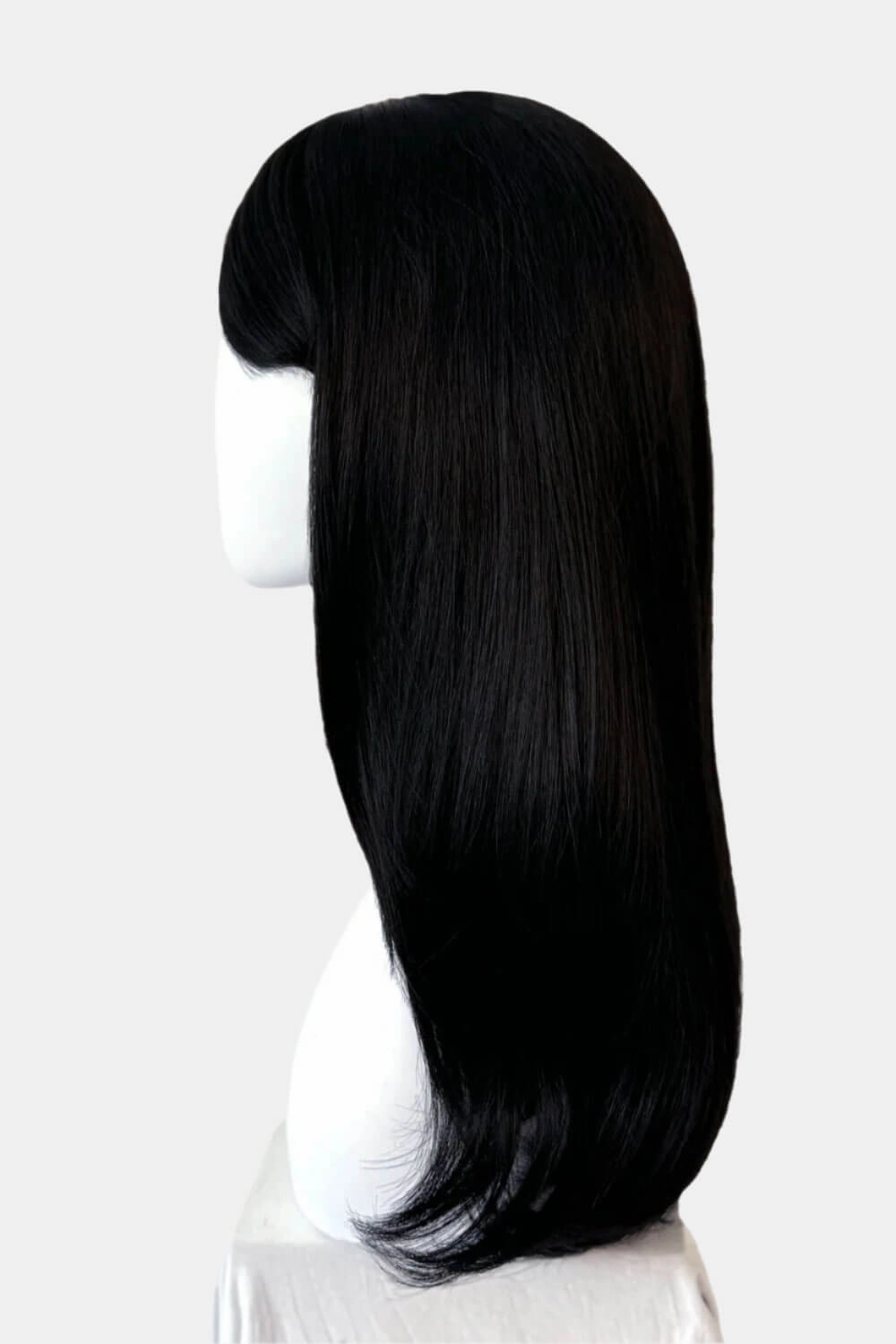 Long black wig, face frame style with full, sweeping fringe: Corina