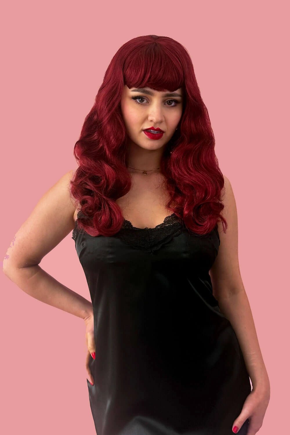 Long cherry red pin-up wig, gently wavy with short fringe: Maeve