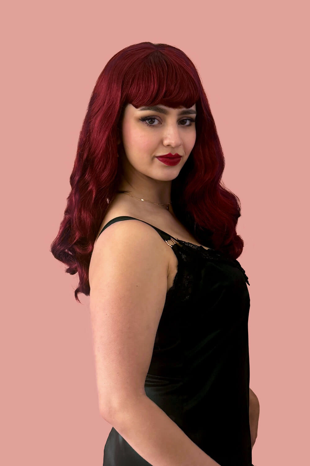 Long cherry red pin-up wig, gently wavy with short fringe: Maeve