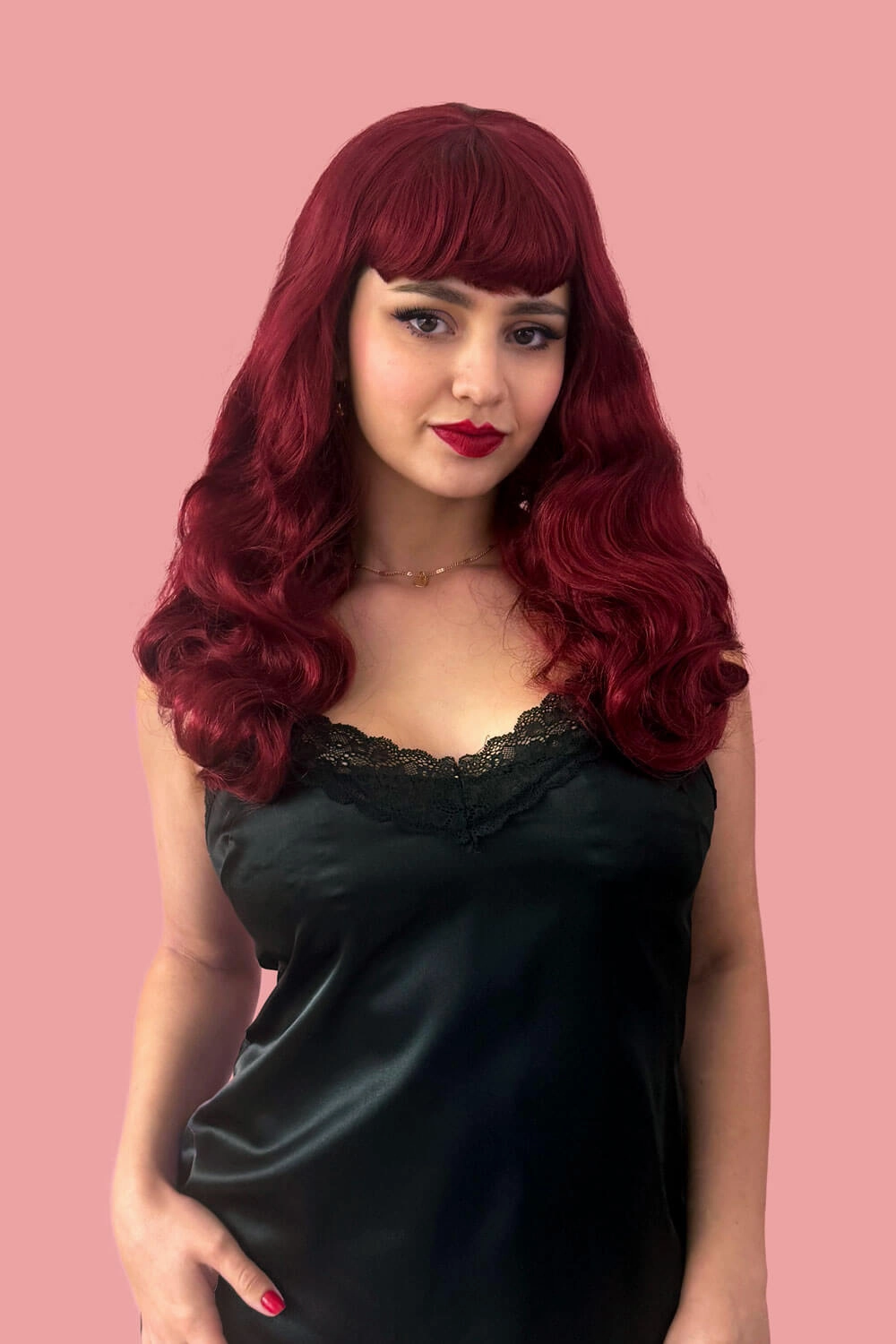 Long cherry red pin-up wig, gently wavy with short fringe: Maeve