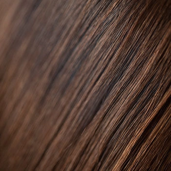 Long chestnut brown wig with blonde highlights and pinup-style fringe: Zola