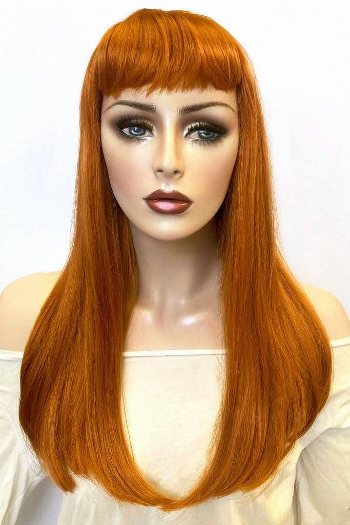 Long ginger wig with straight hair and a short, straight fringe: Daphne