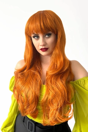Long wavy ginger wig with vintage-style straight fringe: Coral