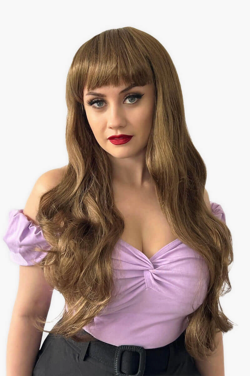 Long wavy light brown wig with vintage-style straight fringe: Maya