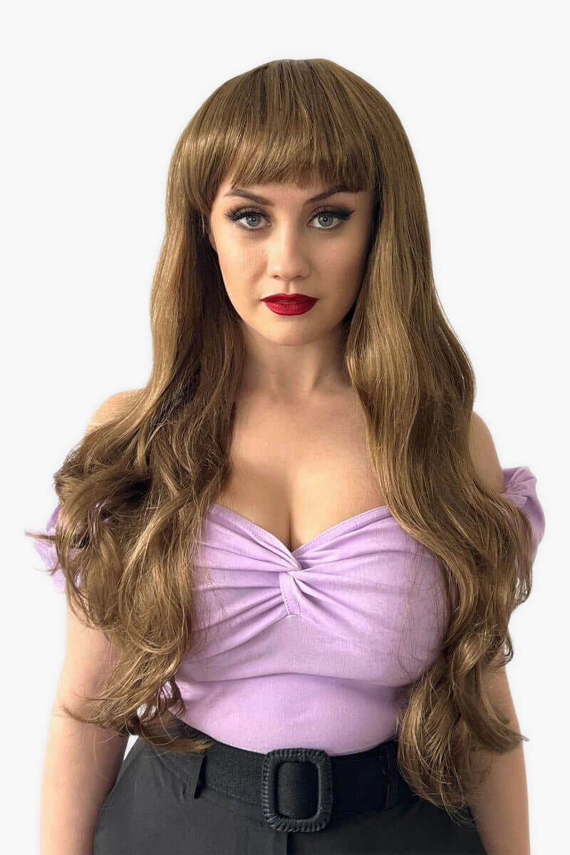 Long wavy light brown wig with vintage-style straight fringe: Maya